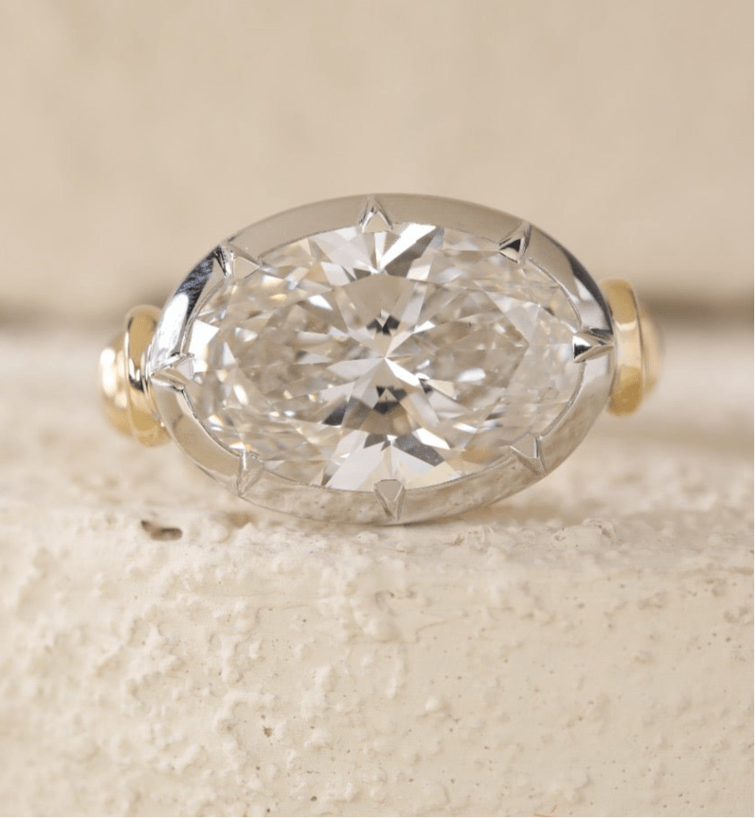 7 carat oval lab grown diamond engagement ring set in two tone collet - Jewelry by Cleo