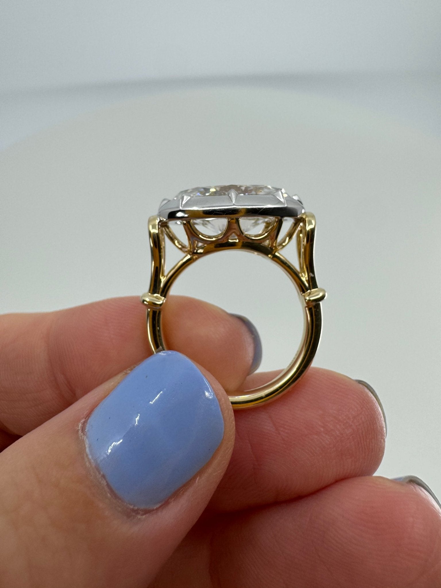 7 carat oval lab grown diamond engagement ring set in two tone collet - Jewelry by Cleo
