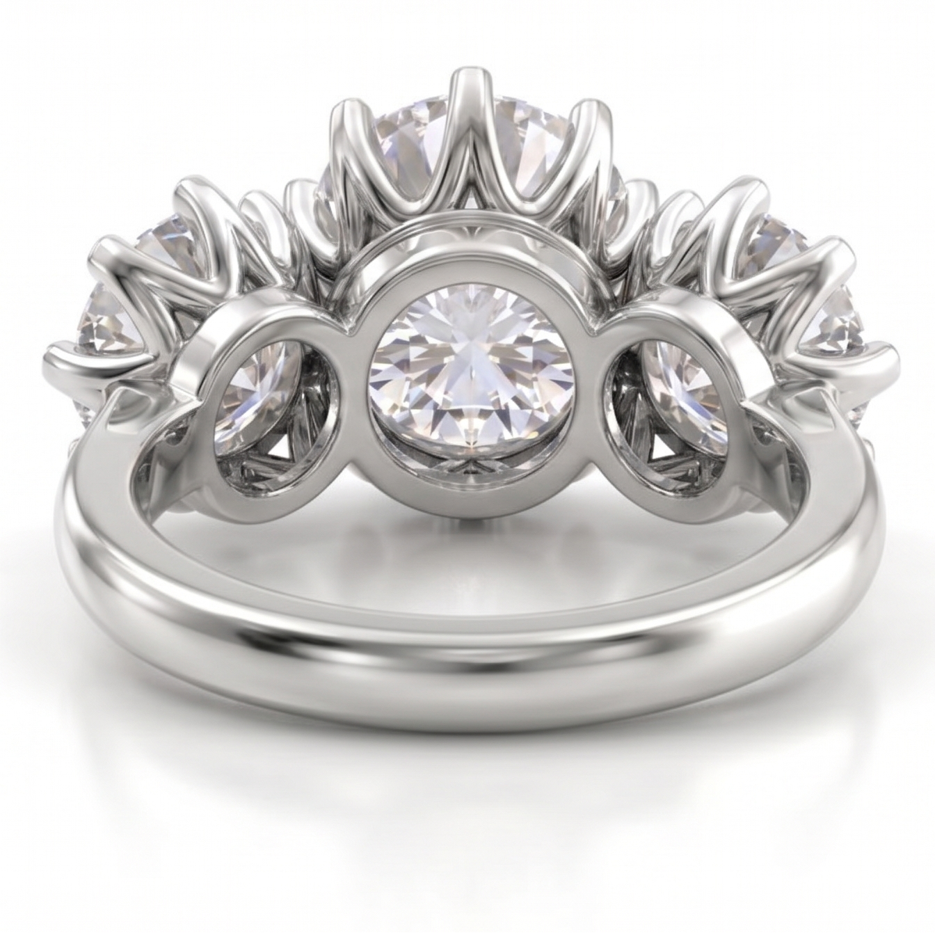 A side-by-side comparison of a three-stone ring in white gold on the left and rose gold on the right, both shown against a clean white background with text labels above.