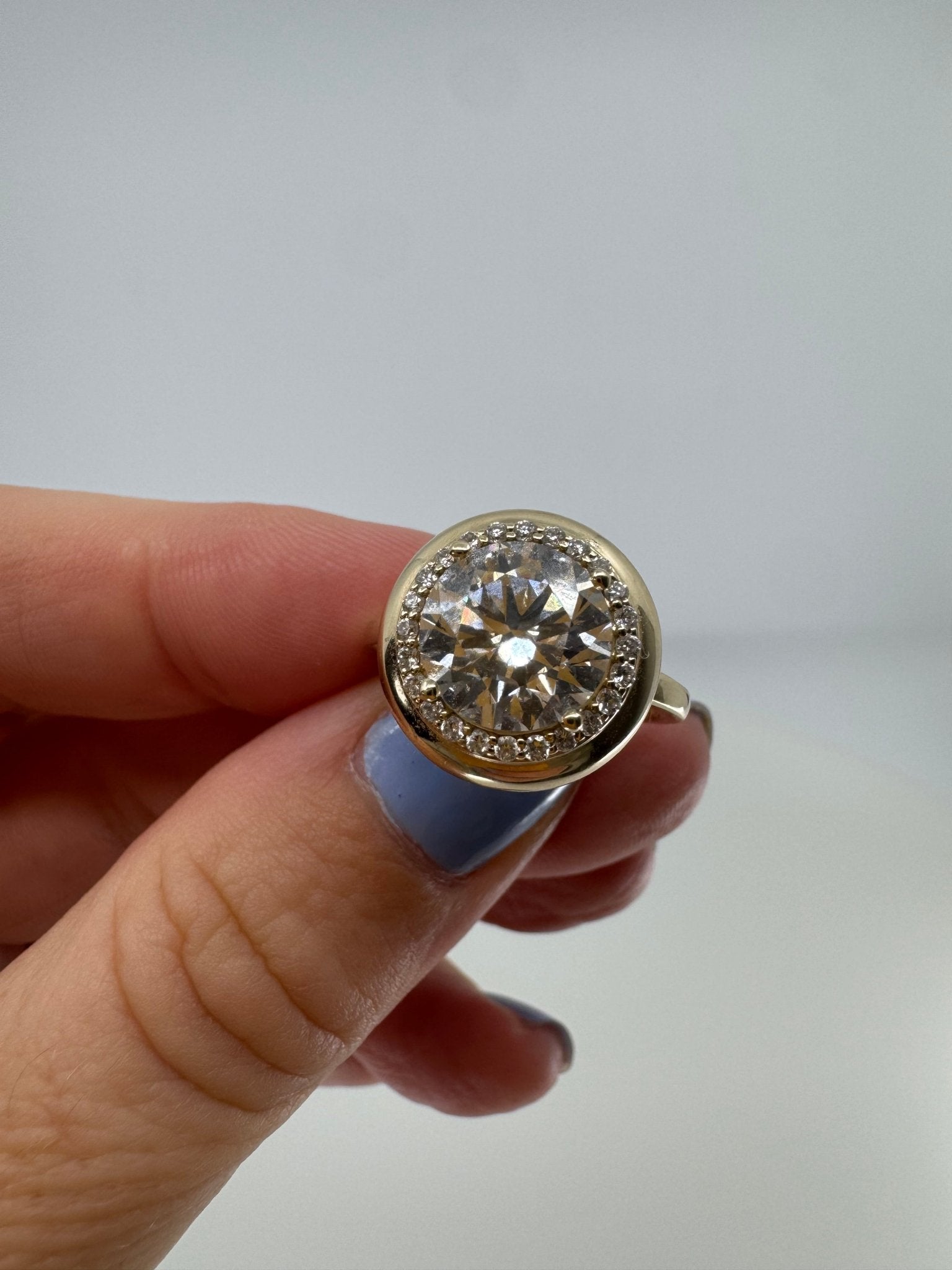 Round brilliant lab grown diamond halo ring in 14k gold bezel - Jewelry by Cleo