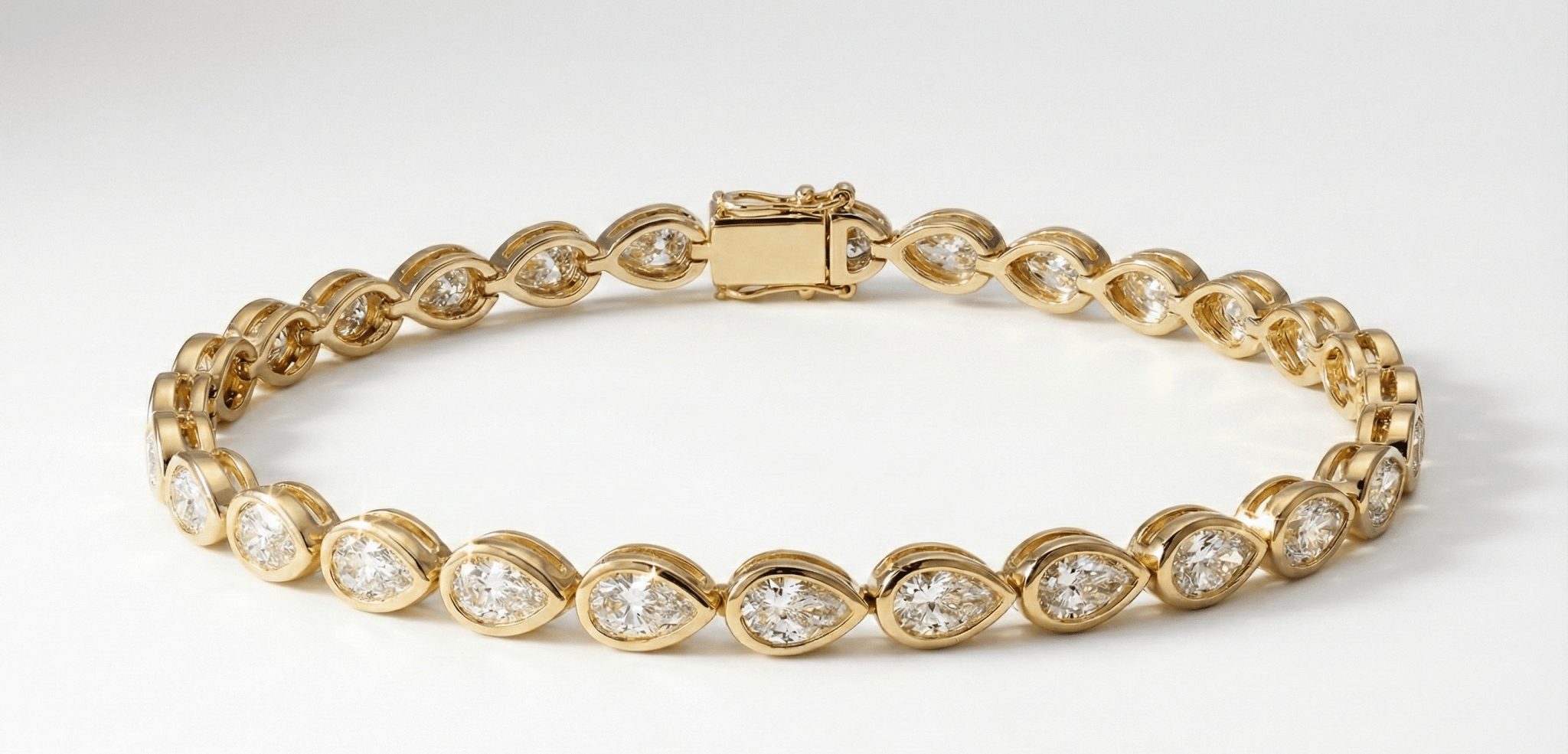 The East - West Pear Bezel Tennis Bracelet - Jewelry by Cleo