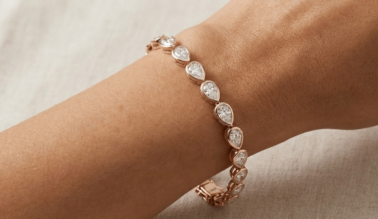 The East - West Pear Bezel Tennis Bracelet - Jewelry by Cleo
