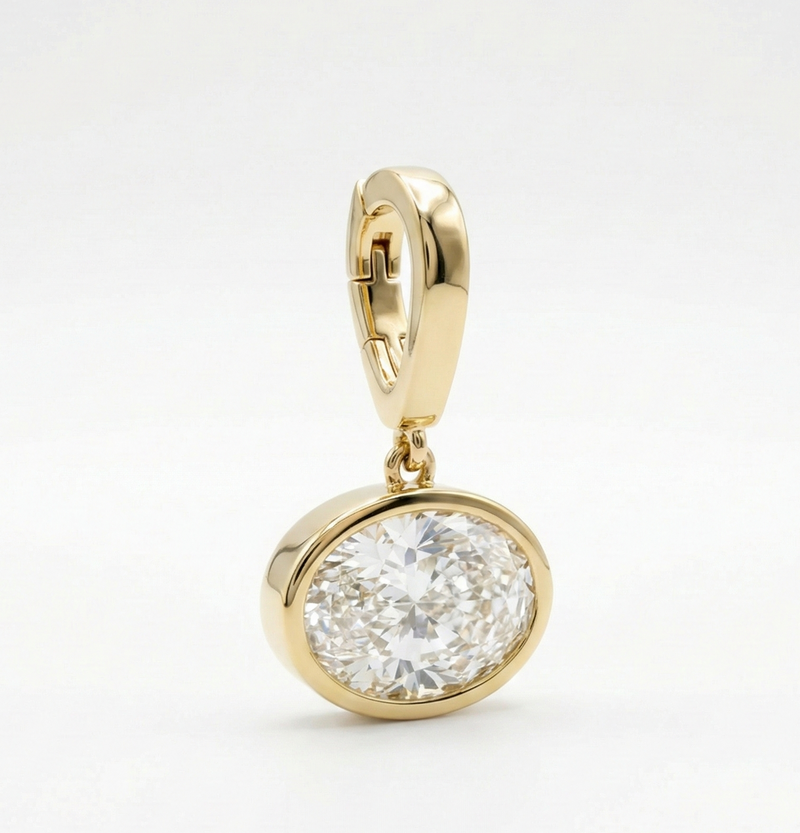 2 carat oval pendant with clasp bail in yellow gold