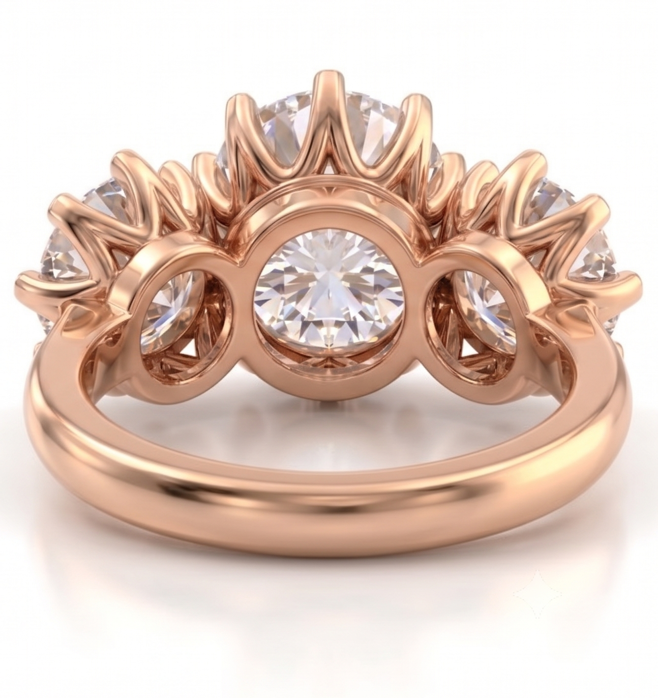 A side-by-side comparison of a three-stone ring in white gold on the left and rose gold on the right, both shown against a clean white background with text labels above.