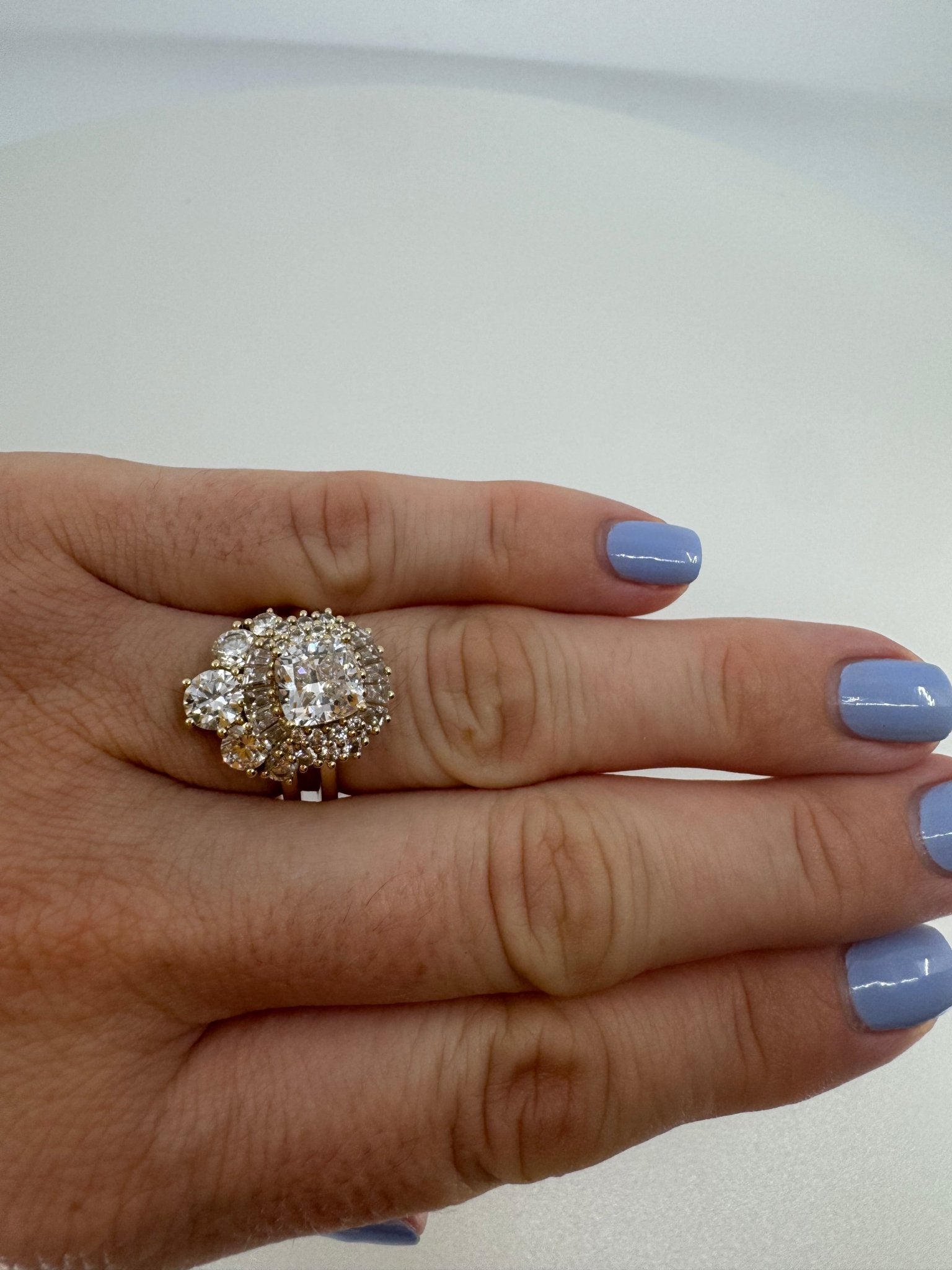 Cushion set in ballerina - inspired halo engagement ring - Jewelry by Cleo