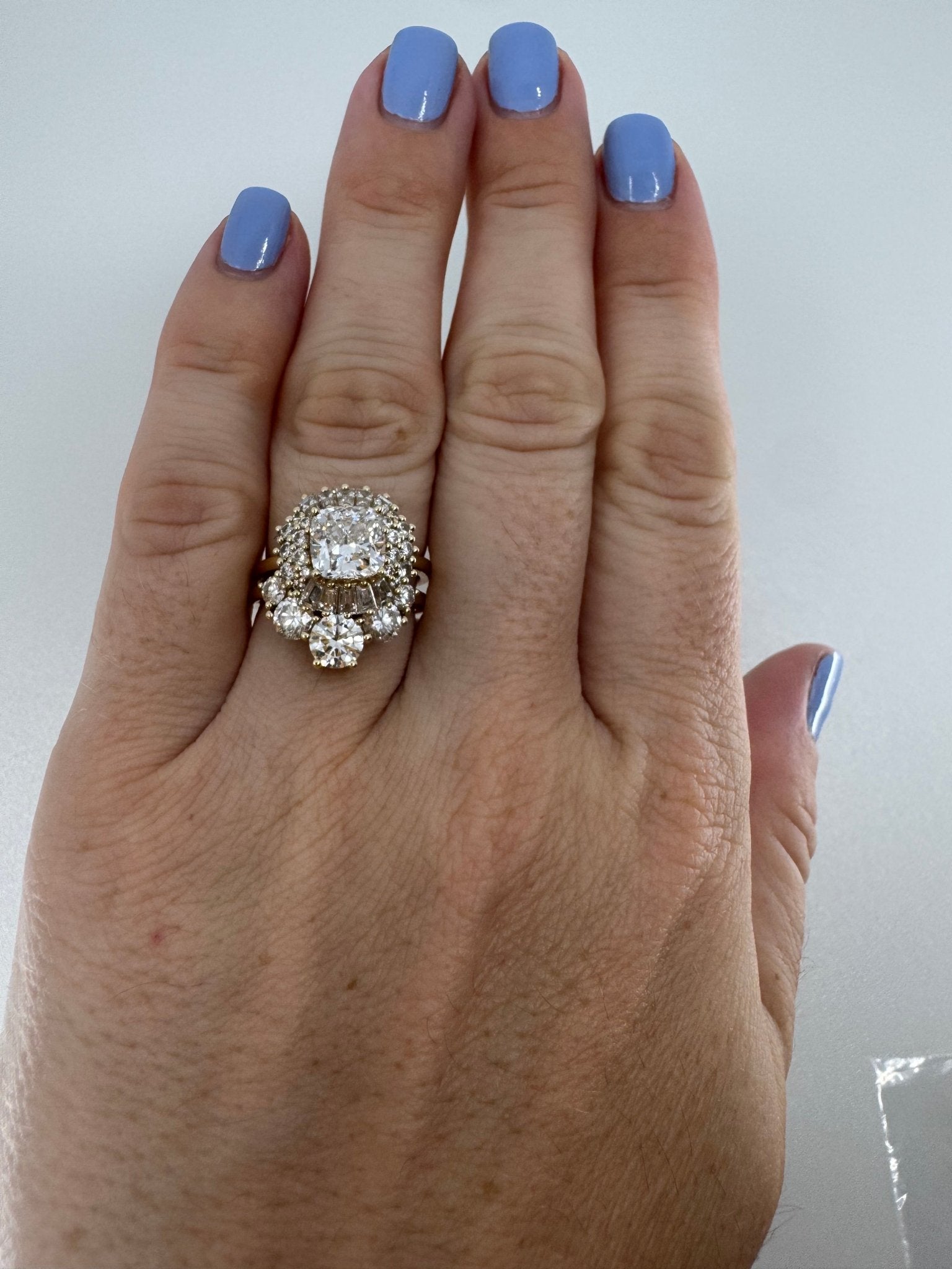Cushion set in ballerina - inspired halo engagement ring - Jewelry by Cleo