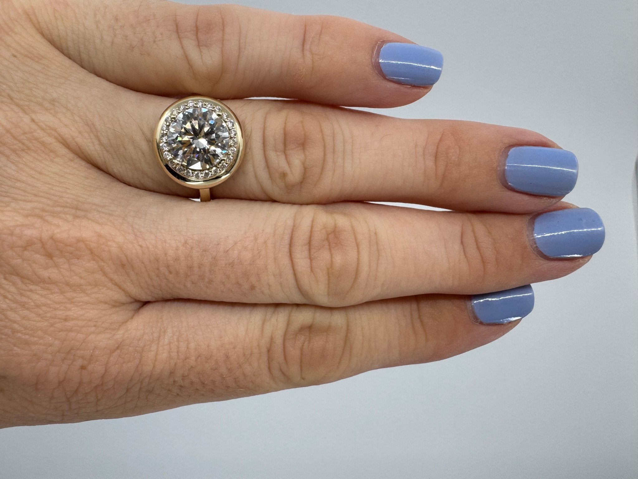 Round brilliant lab grown diamond halo ring in 14k gold bezel - Jewelry by Cleo