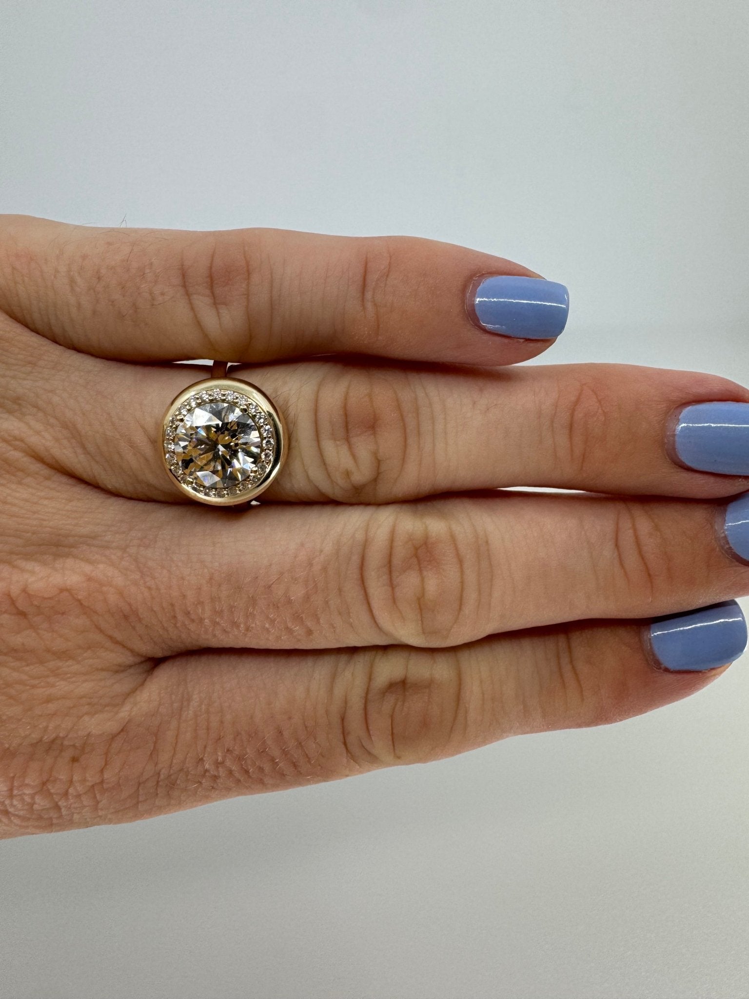 Round brilliant lab grown diamond halo ring in 14k gold bezel - Jewelry by Cleo