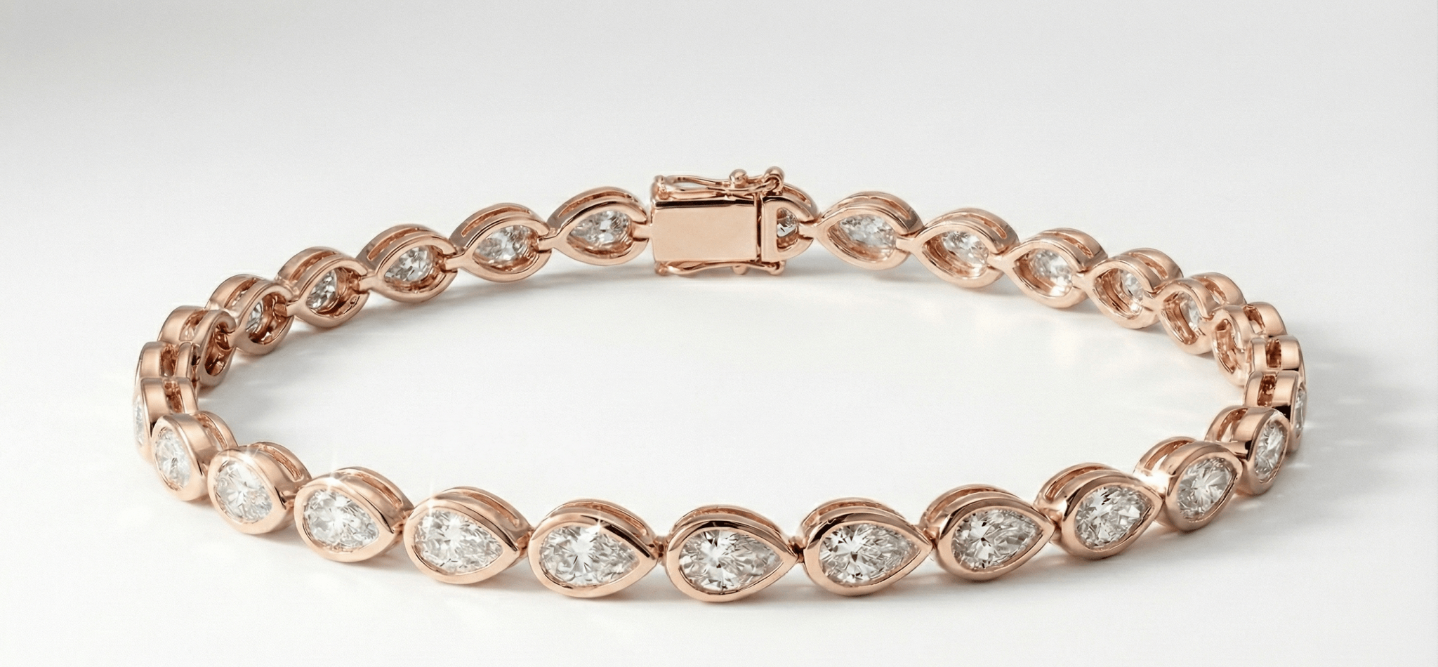 The East - West Pear Bezel Tennis Bracelet - Jewelry by Cleo