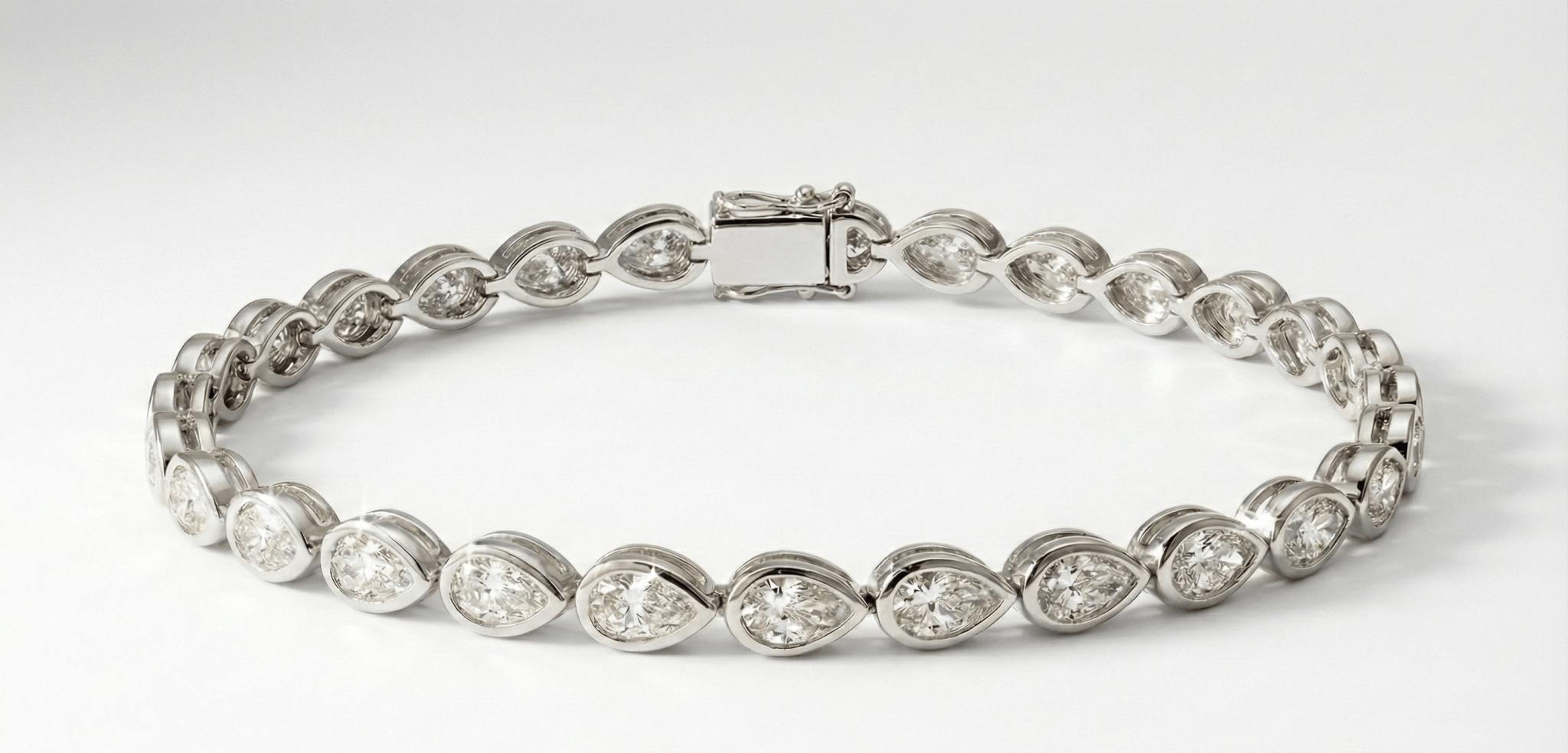 The East - West Pear Bezel Tennis Bracelet - Jewelry by Cleo
